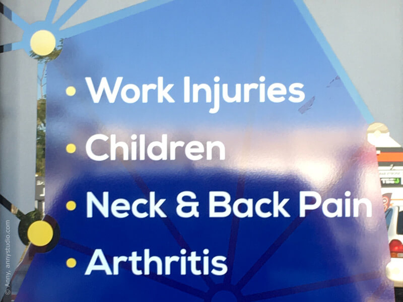 Physiotherapist shopfront: children listed amongst injuries and illnesses.