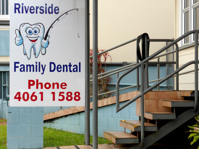 Extracted tooth with a fishing rod of Riverside Family Dental in Innisfail, QLD.